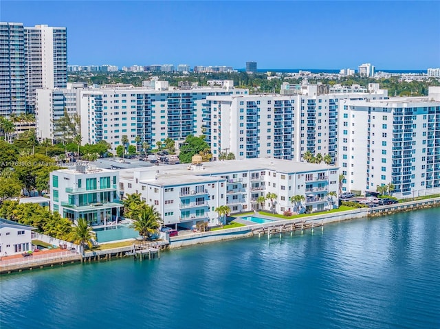 bird's eye view with a view of city and a water view