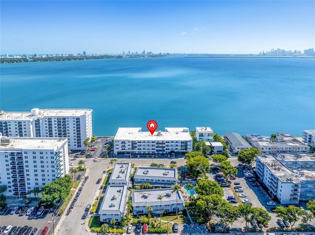 aerial view with a view of city and a water view