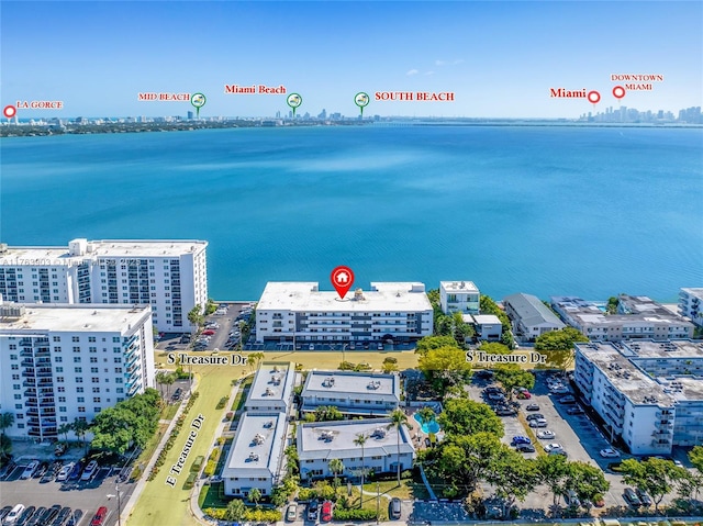 bird's eye view with a city view and a water view