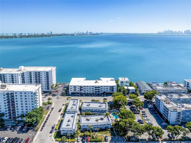 bird's eye view with a water view and a view of city
