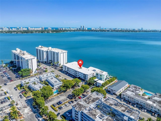 bird's eye view with a city view and a water view