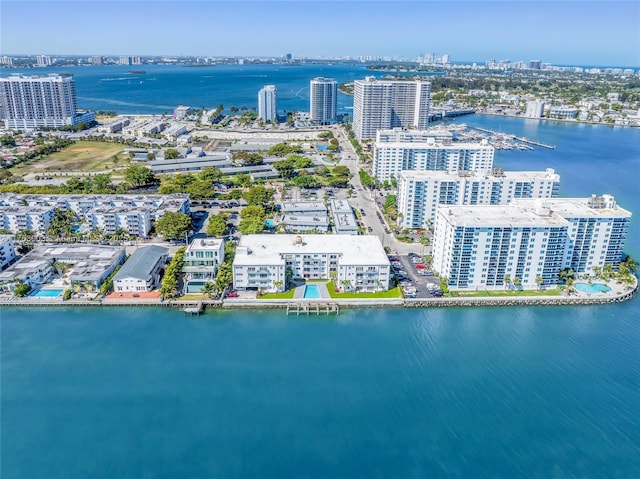 bird's eye view featuring a city view and a water view
