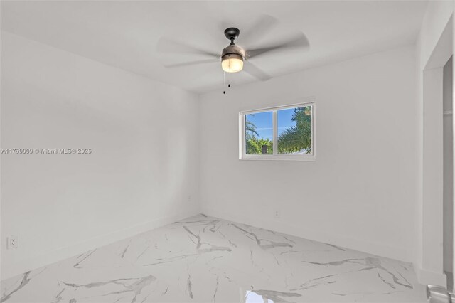 5241 Redwood Ct, Plantation, FL 33317 - empty room with baseboards, marble finish floor, and ceiling fan