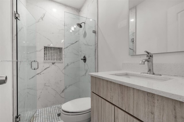 5241 Redwood Ct, Plantation, FL 33317 - full bathroom featuring a marble finish shower, toilet, and vanity