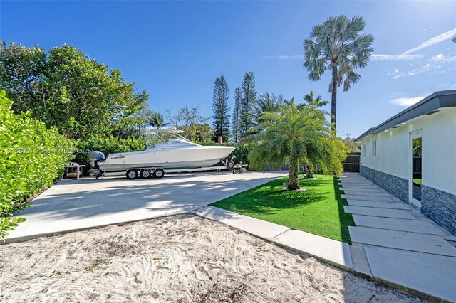 5241 Redwood Ct, Plantation, FL 33317 - view of home's community featuring driveway and a yard