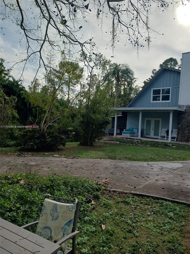 1616 Churchill St, Lake Placid, FL 33852 - view of yard with french doors