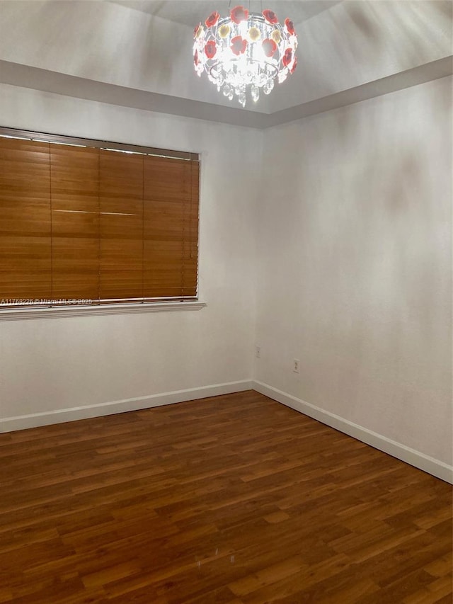 5450 NW 107th Ave Unit 705, Doral, FL 33178 - spare room featuring dark wood-type flooring