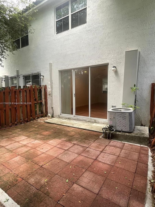 5450 NW 107th Ave Unit 705, Doral, FL 33178 - back of house with a patio area and stucco siding