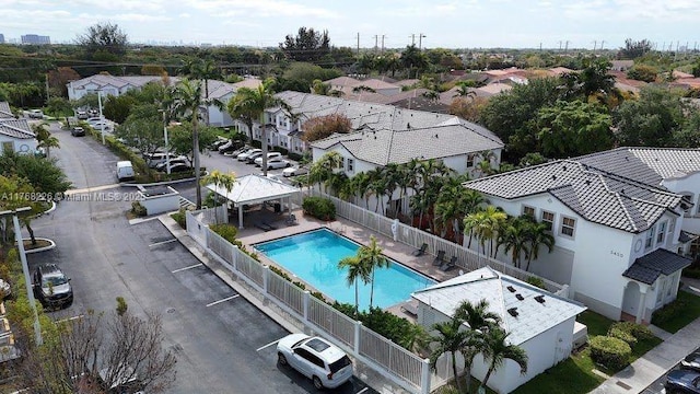 5450 NW 107th Ave Unit 705, Doral, FL 33178 - aerial view of residential area featuring a pool area