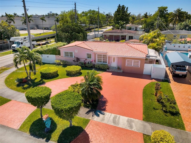 birds eye view of property with a residential view