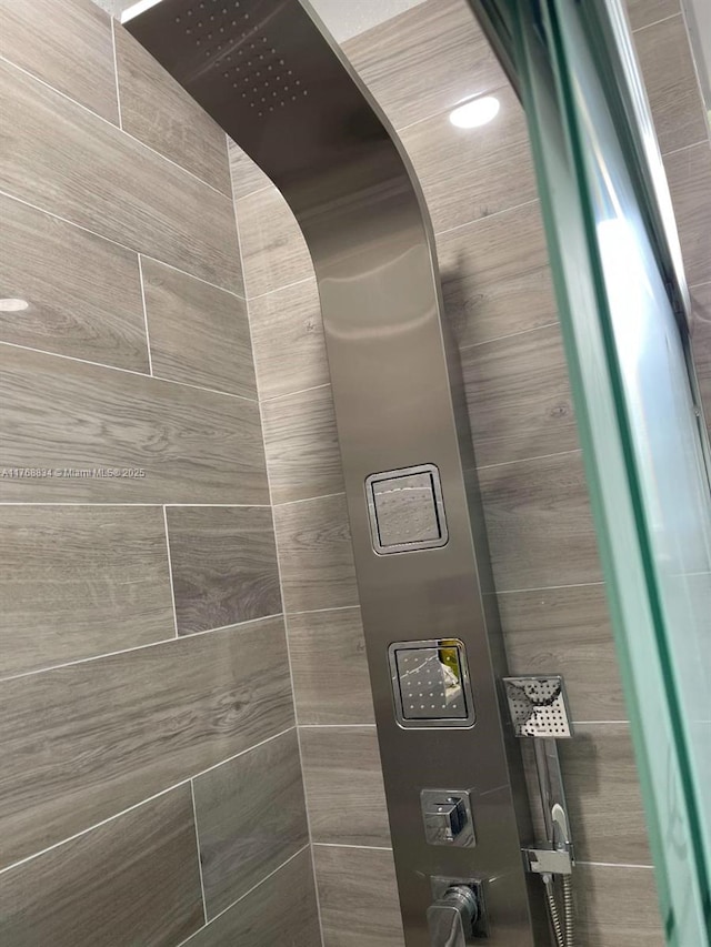 interior details with a shower