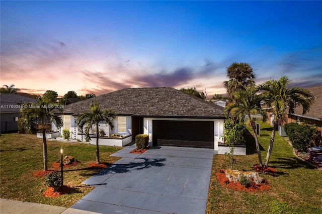 1801 Hancock Bridge Pkwy, Cape Coral, FL 33990 - single story home with a front yard, concrete driveway, a garage, and stucco siding