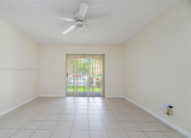 5530 NW 61st St Unit 303, Coconut Creek, FL 33073 - spare room with a textured ceiling, light tile patterned floors, and ceiling fan