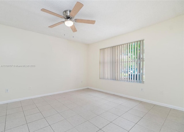 5530 NW 61st St Unit 303, Coconut Creek, FL 33073 - empty room with a ceiling fan and baseboards