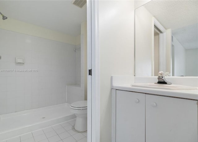5530 NW 61st St Unit 303, Coconut Creek, FL 33073 - bathroom featuring tile patterned flooring, tiled shower, and vanity