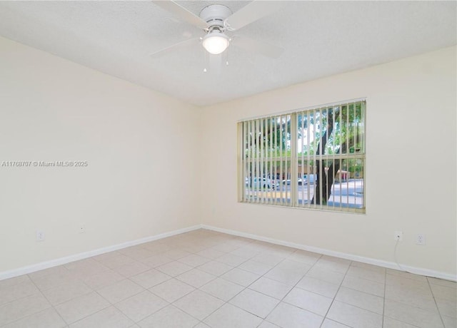 5530 NW 61st St Unit 303, Coconut Creek, FL 33073 - empty room featuring a ceiling fan and light tile patterned floors