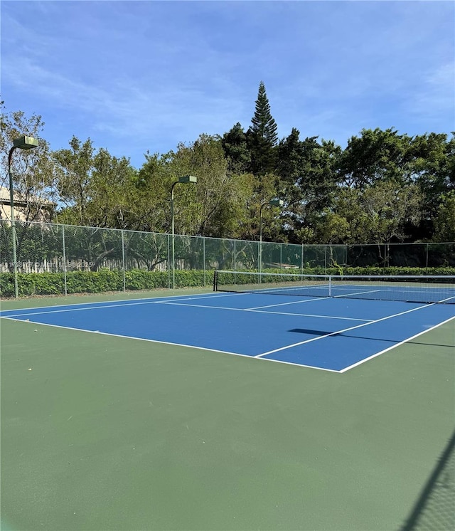5530 NW 61st St Unit 303, Coconut Creek, FL 33073 - view of tennis court with community basketball court