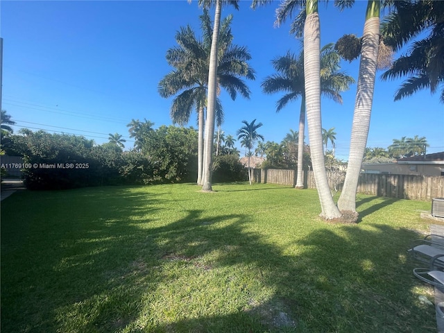 view of yard featuring fence