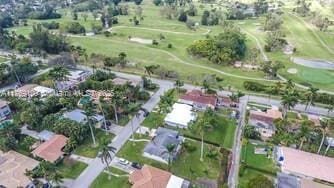 aerial view featuring golf course view