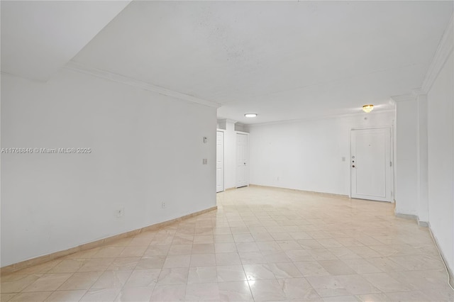 77 Crandon Blvd Unit 2B, Key Biscayne, FL 33149 - unfurnished room featuring crown molding and baseboards