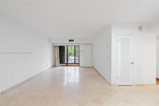 77 Crandon Blvd Unit 2B, Key Biscayne, FL 33149 - spare room with crown molding and a smoke detector