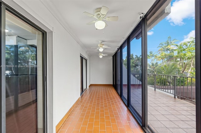 77 Crandon Blvd Unit 2B, Key Biscayne, FL 33149 - hall featuring a wall of windows, plenty of natural light, and crown molding