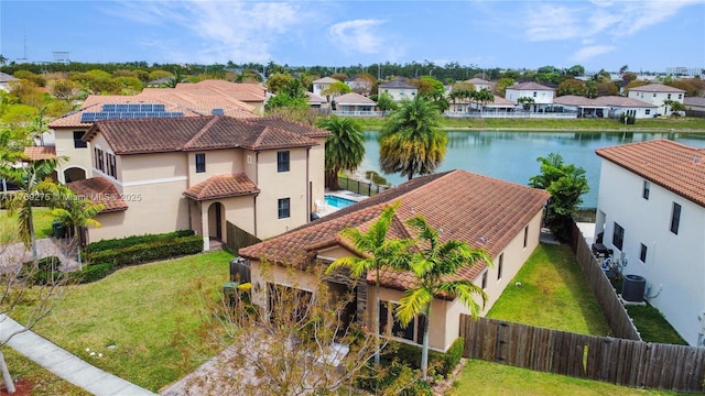 aerial view featuring a water view and a residential view