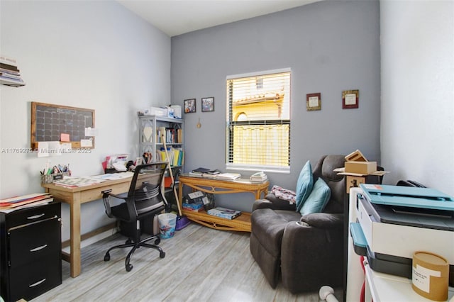 office area with light wood-type flooring