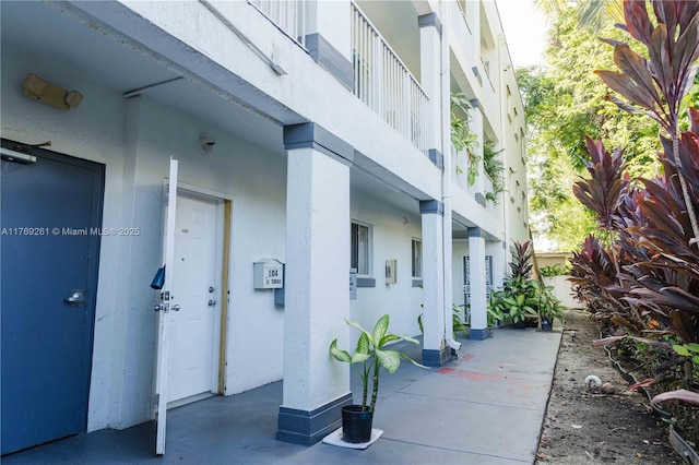 exterior space with stucco siding