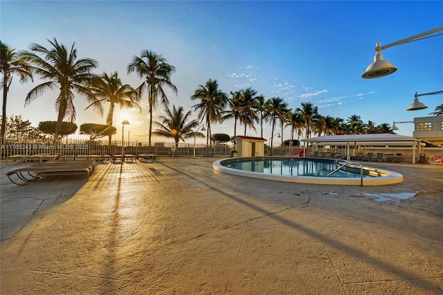 2899 Collins Ave Unit 1638, Miami Beach, FL 33140 - pool at dusk with a community pool