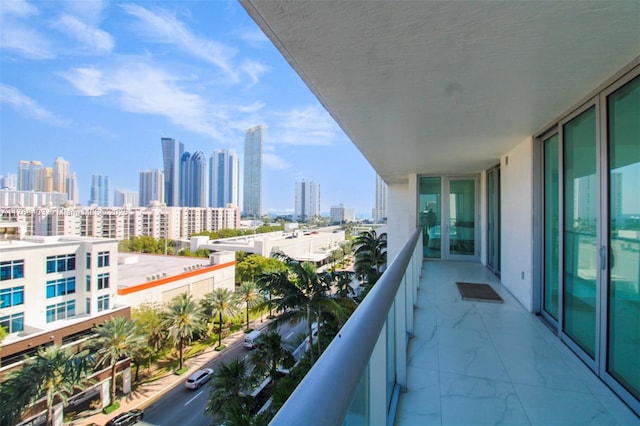 balcony featuring a city view