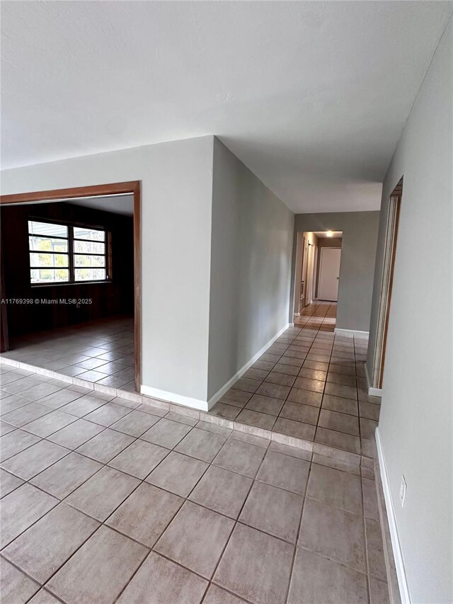 10475 SW 96th Ter, Kendall, FL 33176 - hall featuring baseboards and light tile patterned floors