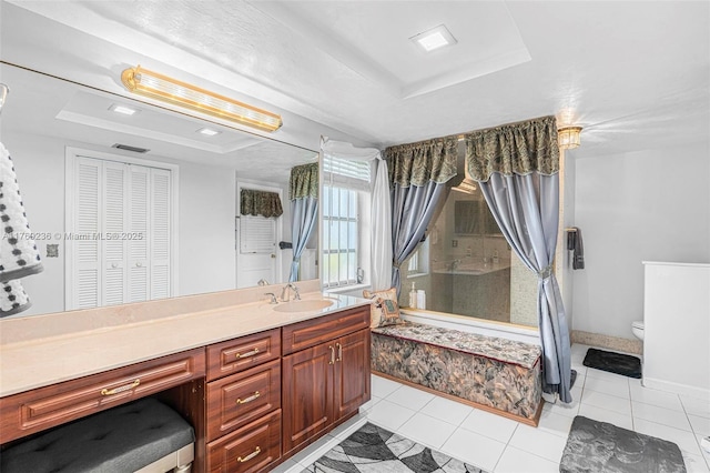 2525 SW 86th Ave, Davie, FL 33324 - bathroom featuring a raised ceiling, vanity, toilet, and a stall shower