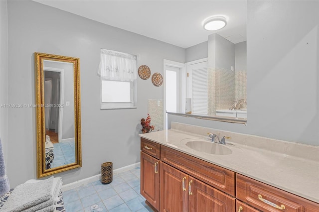2525 SW 86th Ave, Davie, FL 33324 - bathroom featuring tile patterned floors, baseboards, and vanity