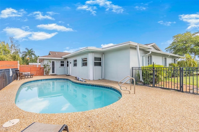 2525 SW 86th Ave, Davie, FL 33324 - view of swimming pool featuring a fenced in pool, fence, and a patio area
