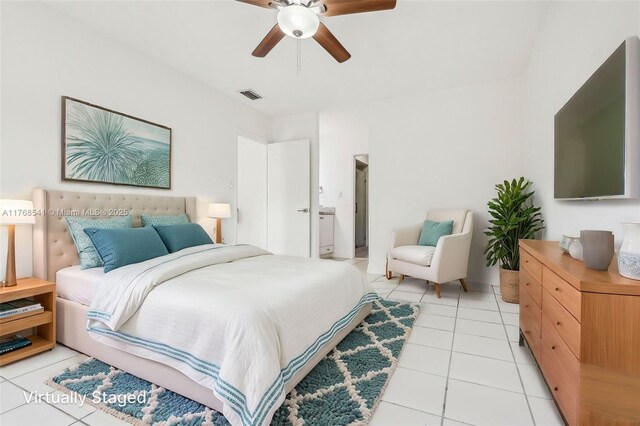 bedroom with a ceiling fan, light tile patterned floors, and visible vents