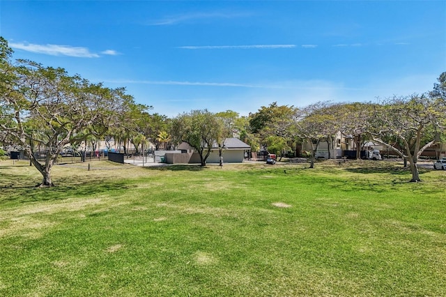 surrounding community featuring a lawn