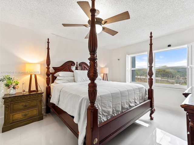 200 Diplomat Pkwy Unit 424, Hallandale Beach, FL 33009 - bedroom with ceiling fan and a textured ceiling