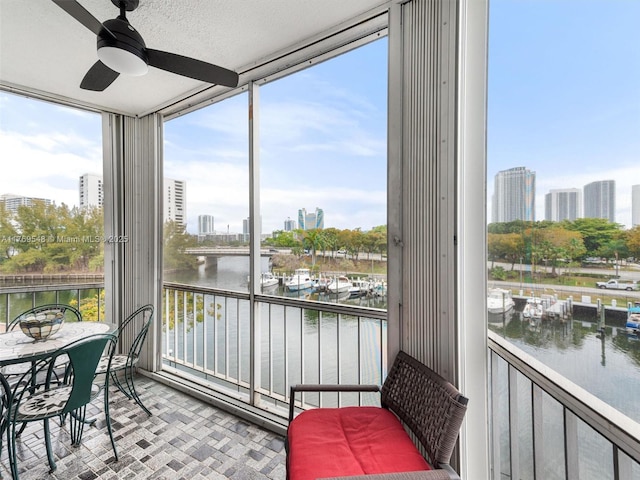 200 Diplomat Pkwy Unit 424, Hallandale Beach, FL 33009 - sunroom featuring a water view and a view of city