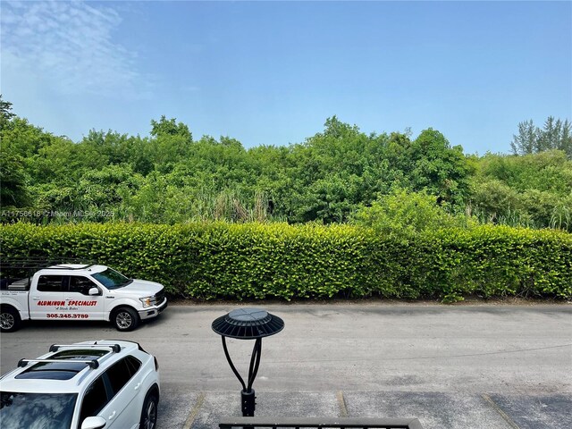 1460 Jefferson Dr Unit H, Homestead, FL 33034 - view of uncovered parking lot