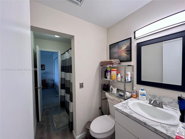 1460 Jefferson Dr Unit H, Homestead, FL 33034 - bathroom featuring toilet, vanity, and wood finished floors