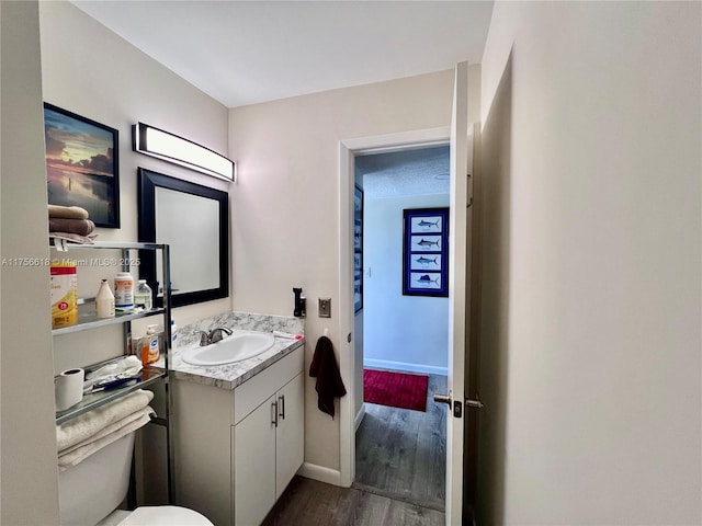 1460 Jefferson Dr Unit H, Homestead, FL 33034 - half bath featuring baseboards, toilet, wood finished floors, and vanity