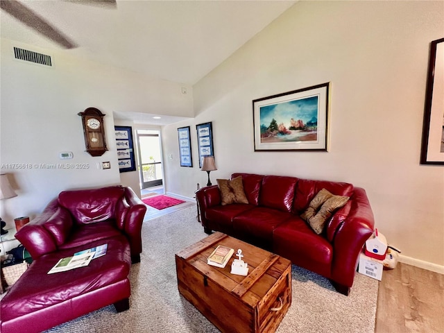 1460 Jefferson Dr Unit H, Homestead, FL 33034 - living room with baseboards, visible vents, and vaulted ceiling
