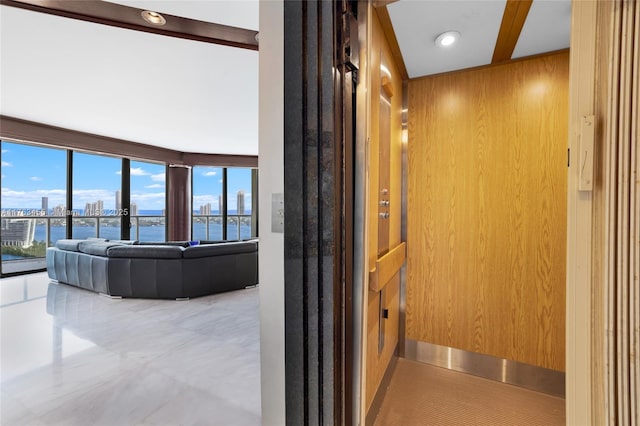 4000 Island Blvd Unit Ph6, Aventura, FL 33160 - hallway with elevator, wood walls, and a view of city