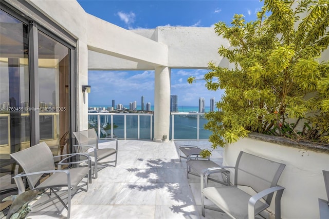4000 Island Blvd Unit Ph6, Aventura, FL 33160 - view of patio with a balcony and a city view