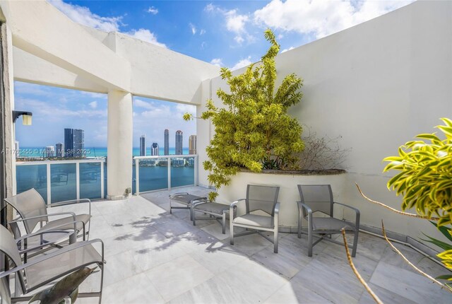 4000 Island Blvd Unit Ph6, Aventura, FL 33160 - view of patio with a balcony and a view of city