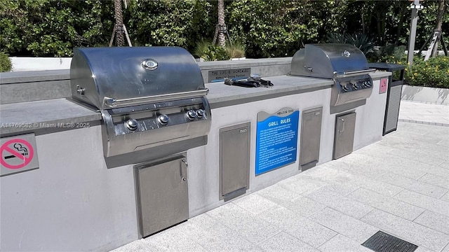 view of patio / terrace featuring grilling area and exterior kitchen