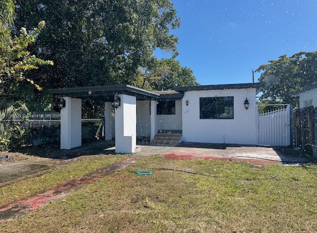 view of front of home with stucco siding