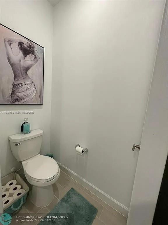 14531 Bretton Woods Trce, Delray Beach, FL 33446 - bathroom with toilet, baseboards, and tile patterned floors