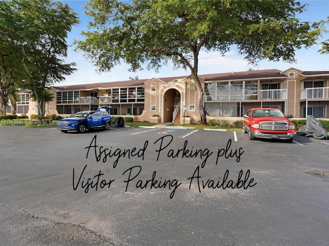 4630 NW 102nd Ave Unit 103-15, Doral, FL 33178 - view of building exterior with uncovered parking